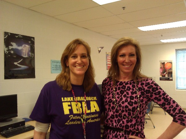 In February, Linda Drake (r), the chapter's lead for its Adopt-a-School program, meets with Eileen Fox, business and information technology instructor, Lake Braddock Secondary School. Fox invited Drake to speak at an upcoming Future Business Leaders of America meeting.